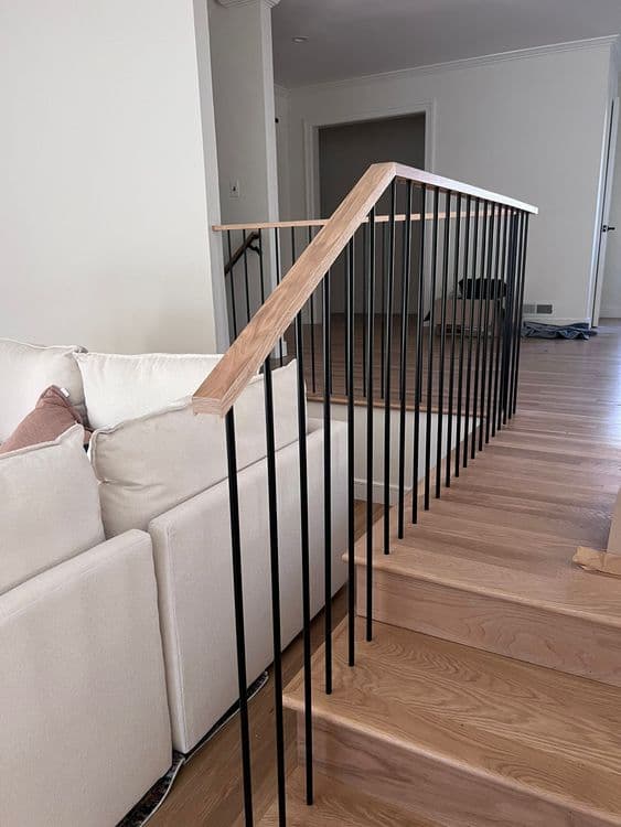 Modern Vertical Railings with a Wood Top